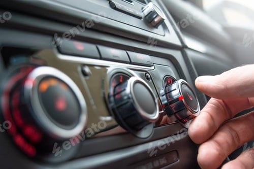 Preview: Button for heating the car seats close-up.