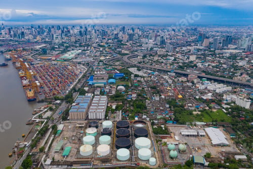 Preview: Petrochemical oil refinery in Bangkok City, Thailand. Oil and gas tanks in industry factory.