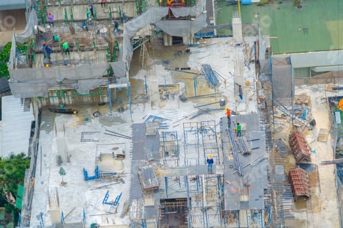 Preview: Busy industrial under construction site workers working and excavators. Top view of precast concrete