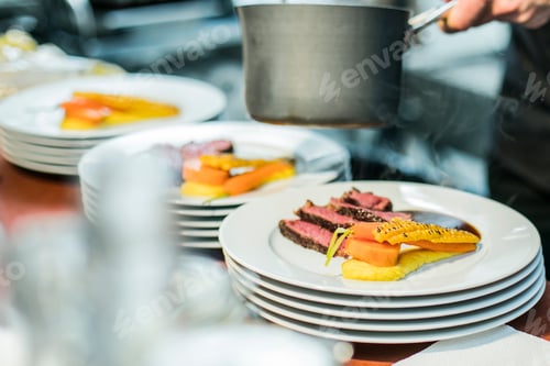 Preview: Dish with meat, corn and carrot is being prepared