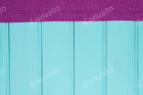 Preview: Purple towel over wooden table