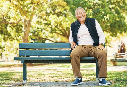 Preview: Park, happy and portrait of old man on bench outdoors for fresh air, wellness and relaxing in retir