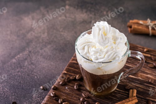 Preview: A cup of sweet Vienna coffee with whipped cream on a dark background