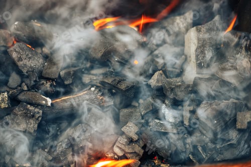 Preview: actively smoldering embers of fire coal barbeque