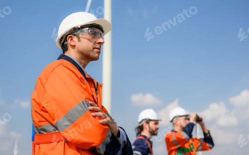 Preview: Maintenance engineer technician team working outdoor at wind turbine field