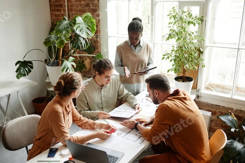 Preview: Designer Team Discussing Project in Studio