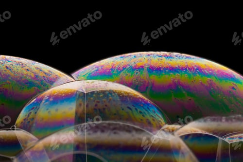 Preview: Macro shot of colorful soap bubbles on a dark background