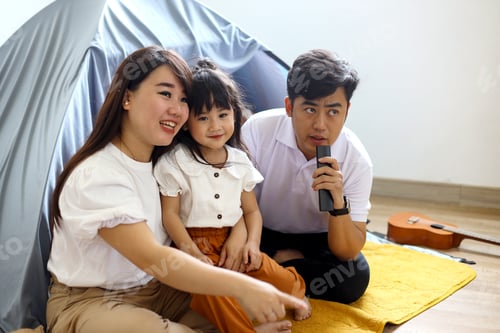 Preview: Happy Asian Family Watching Movie Together