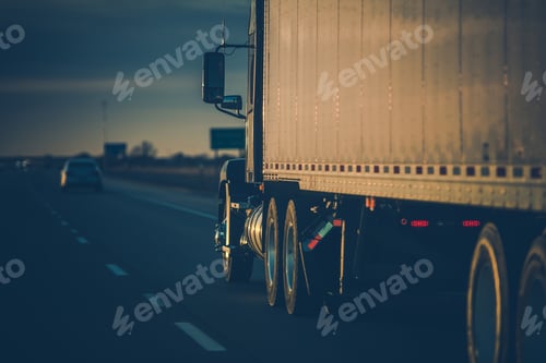 Preview: Semi Truck in Sun Rays on the Road
