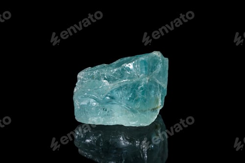 Preview: macro mineral stone aquamarine on a black background