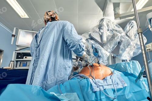Preview: Surgeon Performing Robotic Assisted Surgery in Hospital Room