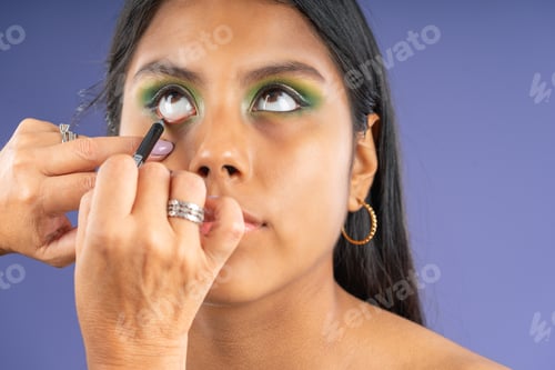 Preview: Finishing up the woman's eye makeup