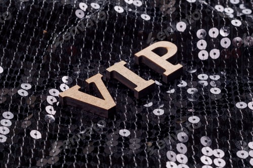 Preview: VIP is written in abstract letters. Black luxurious sparkling background