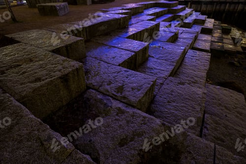 Preview: Stairs made of stones with blue light reflecting of them
