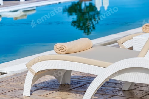 Preview: Sunbed with towel closeup by the poolside