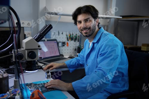 Preview: A scientist at a microscope in a modern lab, focusing on detailed analysis and innovation