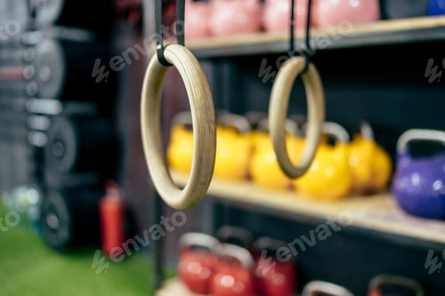 Preview: Focus on rings for exercising in a gym