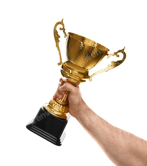 Preview: Young man holding gold trophy cup on white background, closeup
