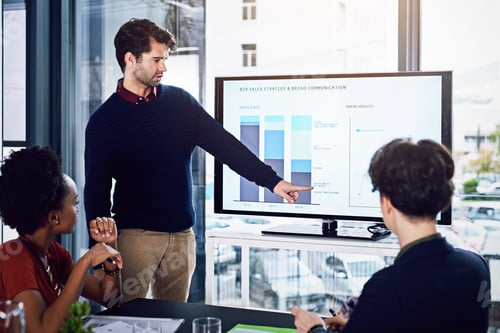 Preview: Cropped shot of a young businessman giving a presentation in the boardroom