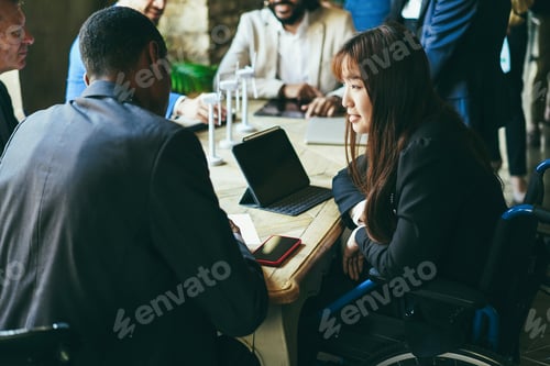 Preview: Multiracial business people working on sustainable innovation project