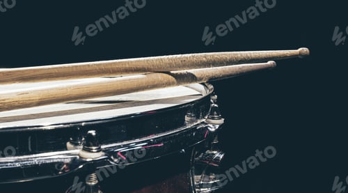Preview: Close-up, snare drum on a dark background isolated, copy space.