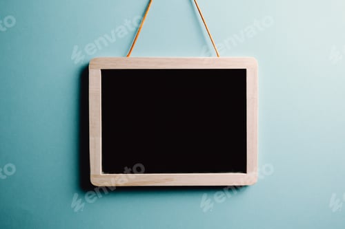 Preview: Horizontal black frame mockup. Minimal black frame on concrete floor.