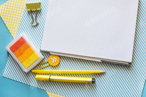 Preview: School supplies. Yellow and blue colors. Empty notebook. Flat lay composition. Space for text.