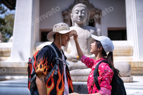 Preview: Traveler tourist man and women with backpack walking in historical place temple Ayuttaya Thailand
