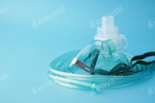 Preview: child nebulizer on blue background top view