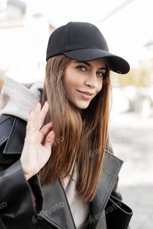 Preview: Stylish beautiful fresh woman in fashion clothes walking on a spring day