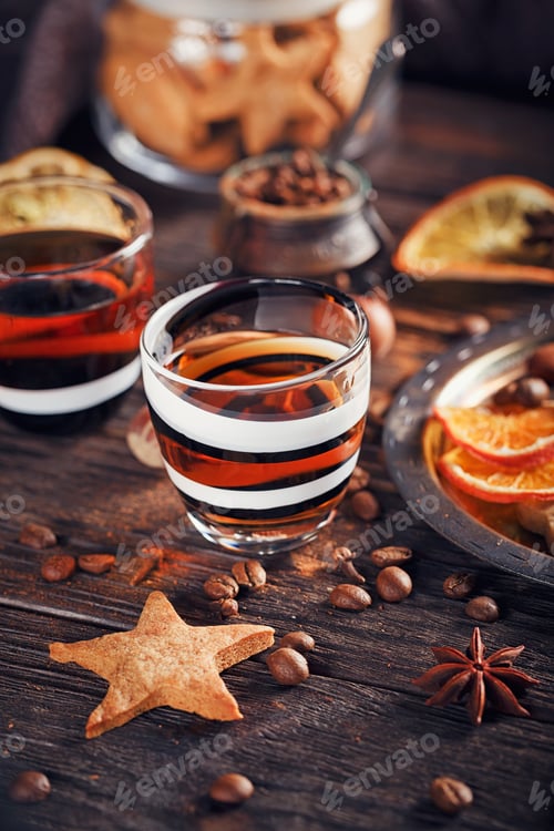 Preview: Whiskey or Liqueur, Cookies, Spices and Decorations on Wooden Background