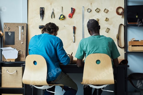 Preview: Two Men Working in Studio Back View