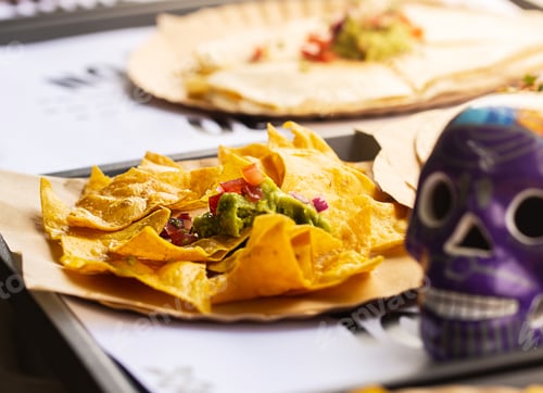Preview: Mexican street fast food with tacos, fajitas and nachos. Chef preparing food in truck