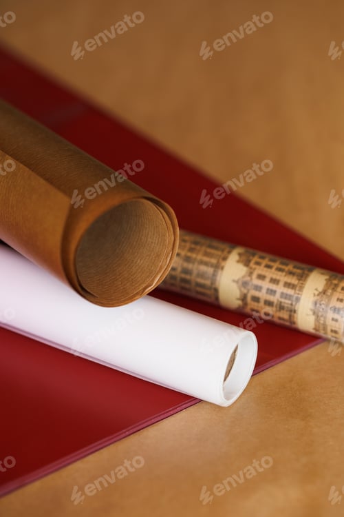 Preview: rolls of beautiful wrapping gift paper on the table