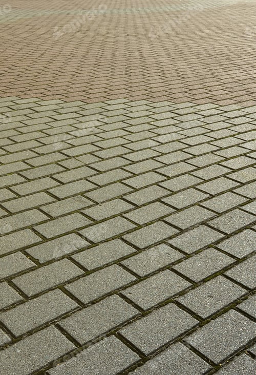 Preview: A large area, covered with a quality paving stone in daylight