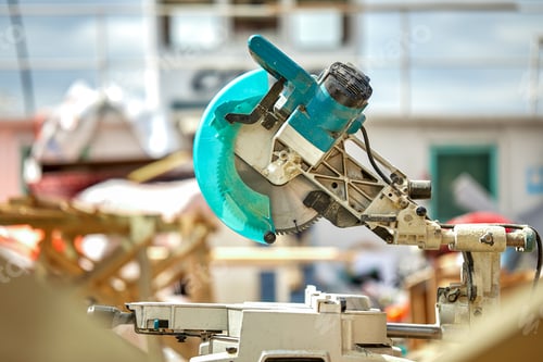 Preview: Close-up of a laser circular saw at a construction site. Products for home and garden and production
