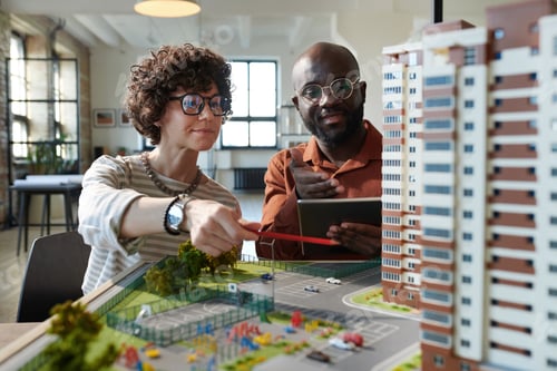 Preview: Architects working in team with construction project