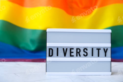 Preview: Rainbow flag with lightbox and text DIVERSITY. Rainbow lgbtq flag made from silk material. Symbol of