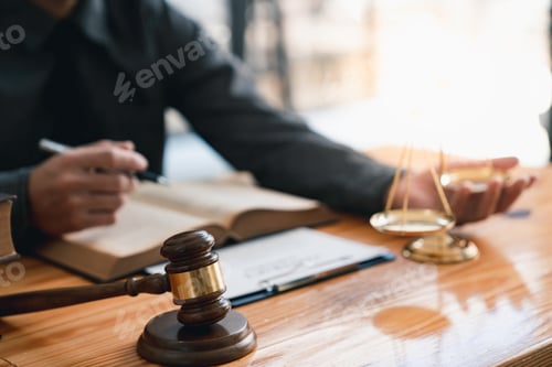 Preview: Attorney reading law code, studying constitution to protect human rights closeup, Male lawyer or jud