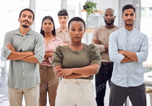 Preview: Shot of a group of businesspeople standing together in an office