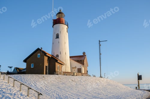 Preview: Lighthhouse of Urk Netherlands during sunset in the Netherlands