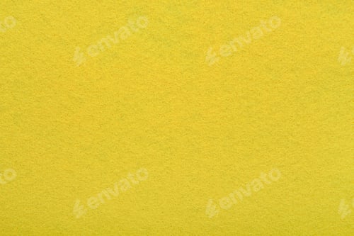 Preview: Yellow felt texture background - close-up of soft fabric surface.