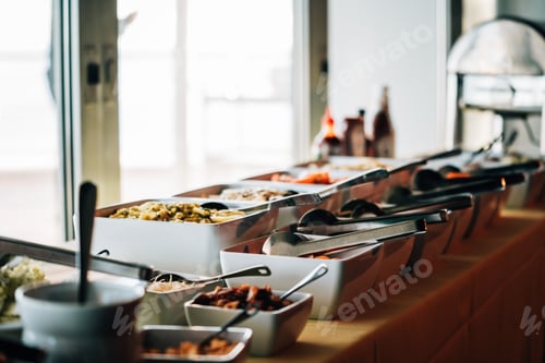 Preview: Banquet table presented at a special event or gathering, featuring an array of delicious food
