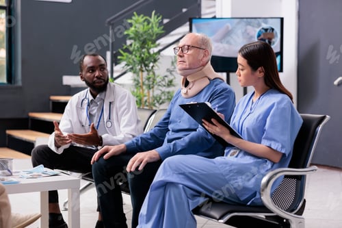 Preview: Elderly patient wearing cervical brace to recover after accident while medical staff explaining