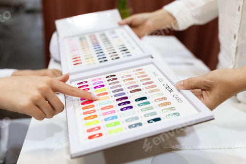 Preview: Selecting nail colors at a salon during a pampering session for women