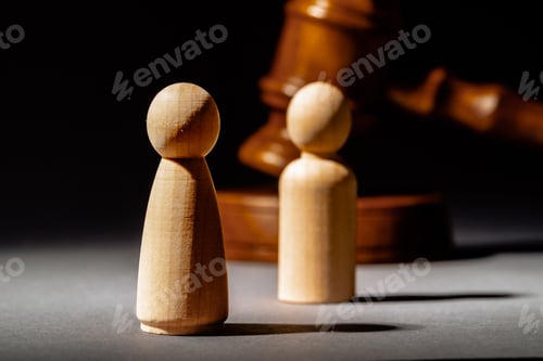 Preview: Wooden toy family and judge mallet. Family divorce concept