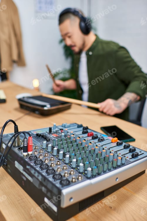 Preview: Asian Multi-Instrumentalist Creates Music in a Studio