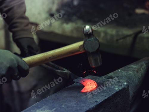 Preview: Crop farrier forging iron in workshop