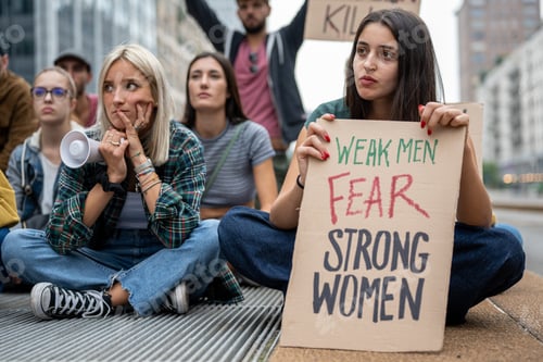 Preview: Young woman in multiracial group of people in a strike for equality and women rights