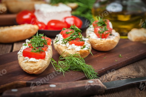 Preview: Delicious bruschetta with tomatoes, feta cheese, dill and spice